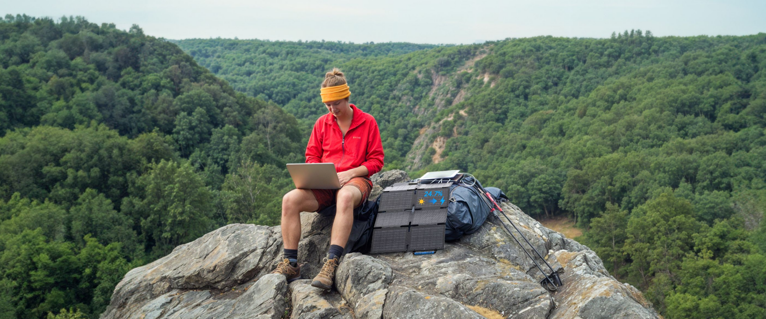 BLUETTI SORA 60 solar panel charging outdoors on a rocky overlook